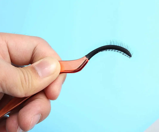 Ergonomic eyelash curler aid with precision and comfort
