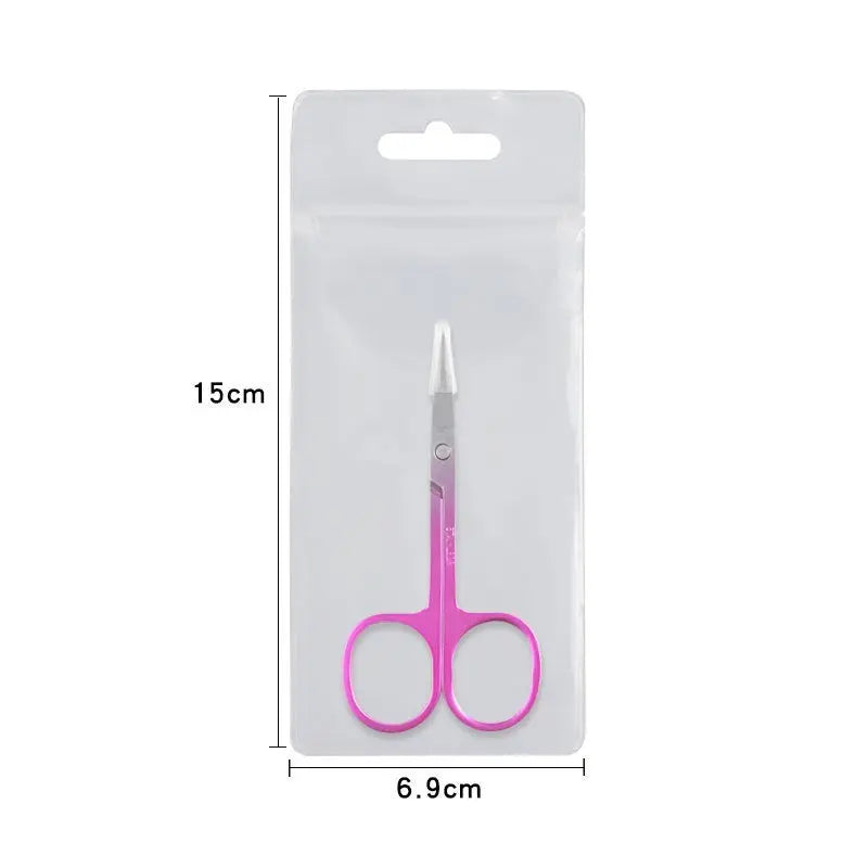 Pink scissors in packaging with dimensions indicated